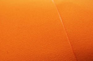 close up of orange acrylic awning fabric 