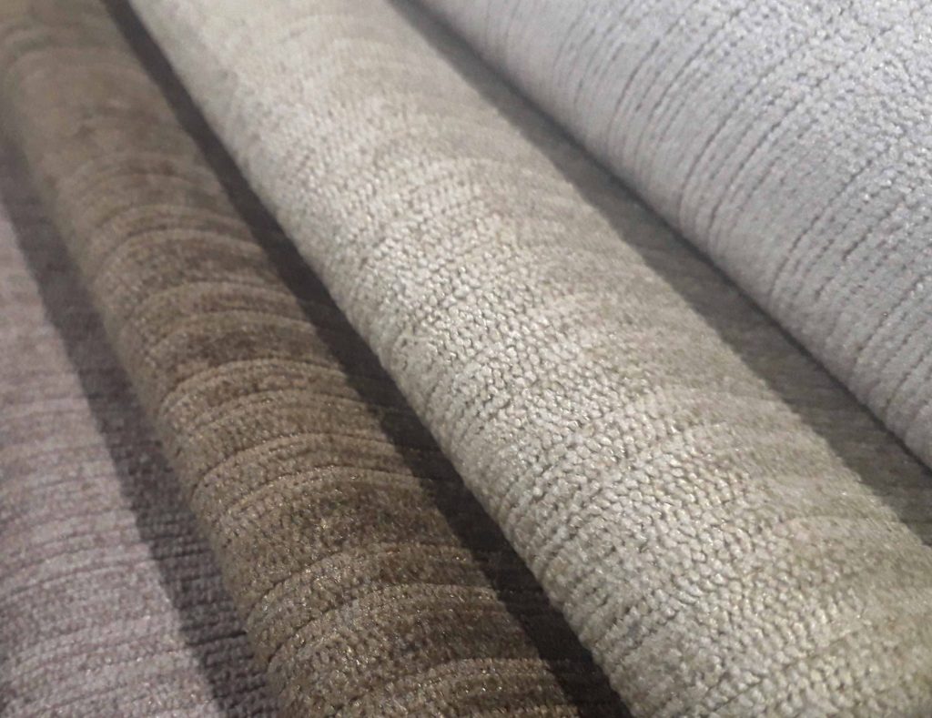 Warm neutral shades of Pebble, Dessert, Taupe and Mink Topaz upholstery fabric