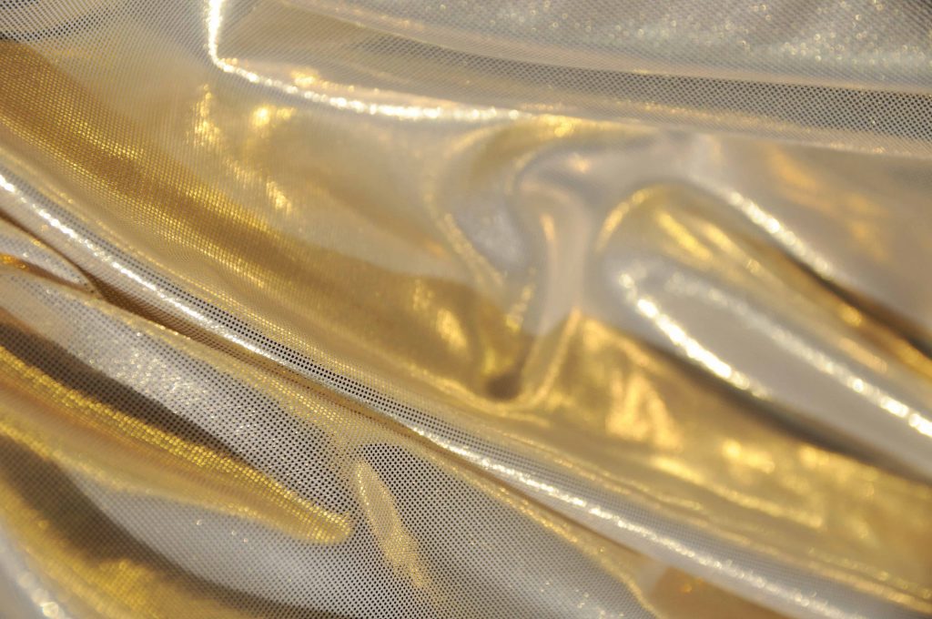 pale gold metallic fabric for Christmas displays fashion and merchandising