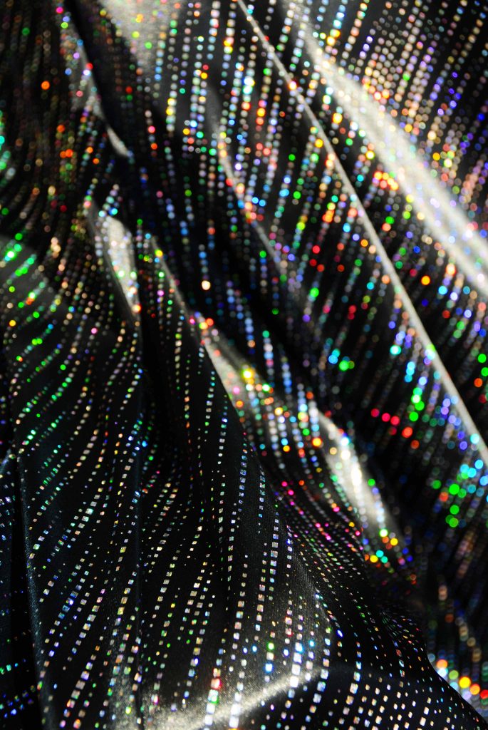 holographic cyber streak dotted lines design  on black satin polyester fabric rave wear display hologram silver 